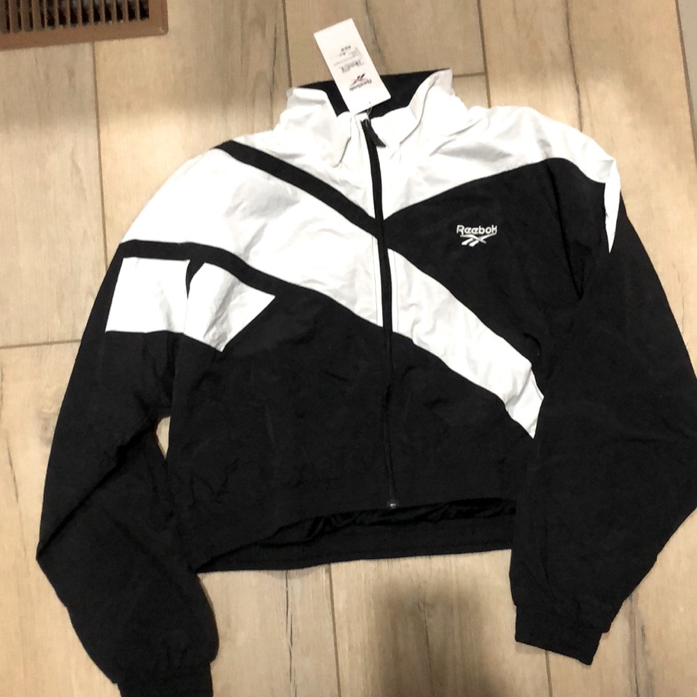 Reebok Cropped jacket. Brand new. Size Medium. tags still on